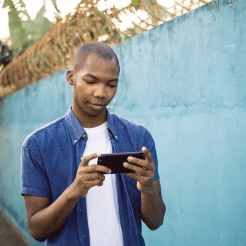 Young Kenyan professional working on a laptop
