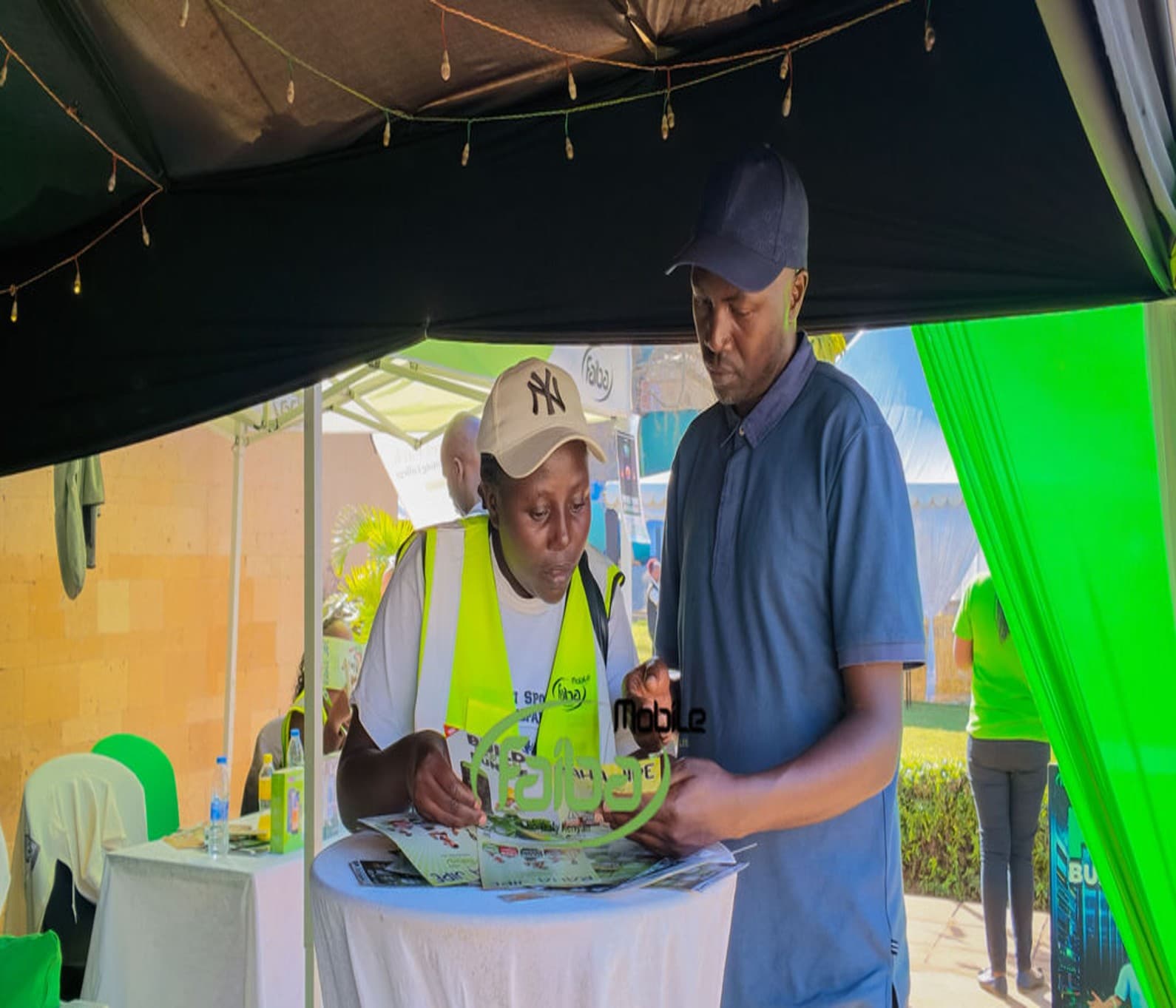 Our Sales Team activating a Faiba sim-card line to our customer
